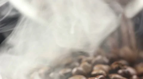 Roasting coffee beans intersperse into a pile Stock Footage 56708698