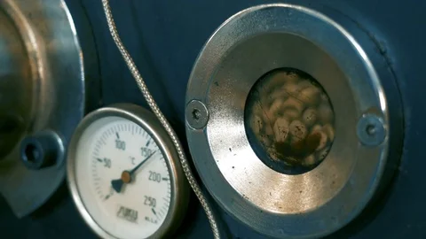 Roasting coffee beans in the oven. Coffee production. Stock Footage 82305209