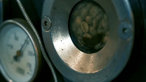 Roasting coffee beans in the oven. Coffee production. Stock Footage 82305334