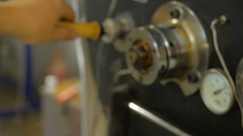 Roasting coffee beans in the oven. Coffee production. Stock Footage 82504317
