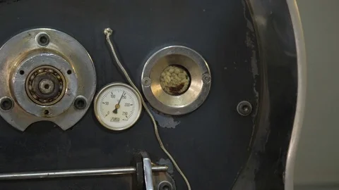 Roasting coffee beans in the oven. Coffee production. Stock Footage 82505031