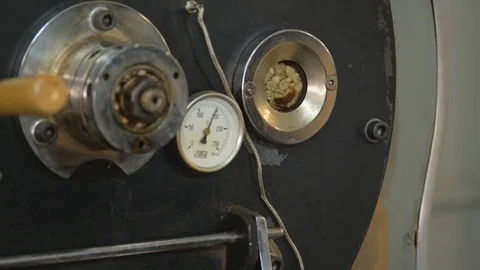 Roasting coffee beans in the oven. Coffee production. Stock Footage 82505049