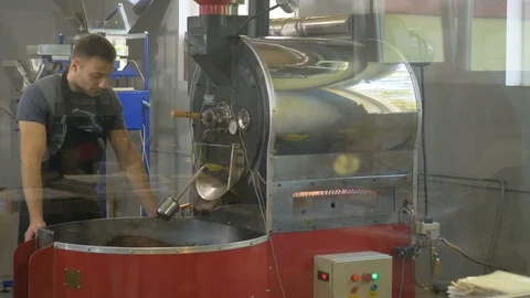 Roasting coffee beans in the oven. Coffee production. Stock Footage 82505128