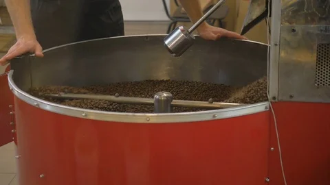 Roasting coffee beans in the oven. Coffee production. Stock Footage 82505255