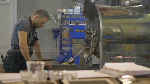 Roasting coffee beans in the oven. Coffee production. Stock Footage 82505484