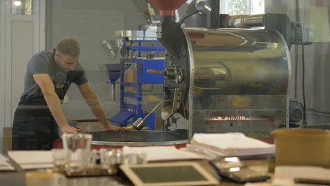 Roasting coffee beans in the oven. Coffee production. Stock Footage 82505662