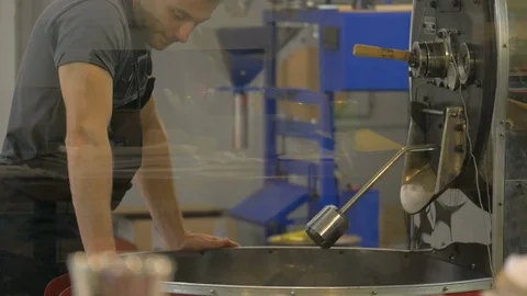 Roasting coffee beans in the oven. Coffee production. Stock Footage 82505749