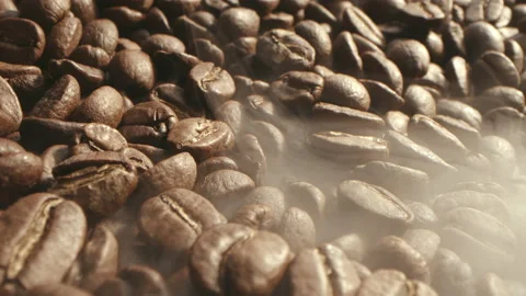 From roasting coffee beans, soft diffuse smoke emanating from roasted coffee Video stock 229784371