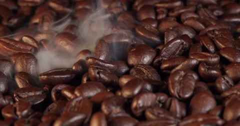 From roasting coffee beans, soft diffuse smoke emanating from roasted coffee Stock Footage 236361671
