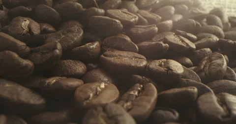 From roasting coffee beans, soft diffuse smoke emanating from roasted coffee 動画素材 257634225