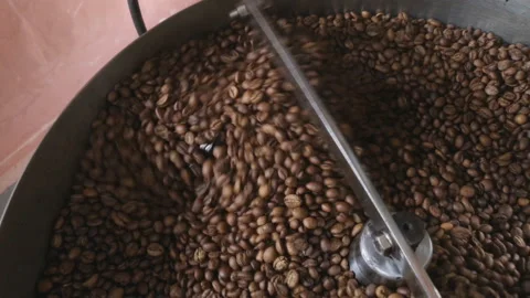 Roasting coffee beans in a traditional machine Stock Footage 141252549