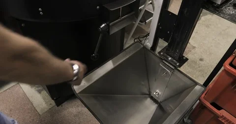 Roasting Coffee Beans Whirling Mixed On Cooling Unit Platform In A Manufactory Stock Footage 77364077