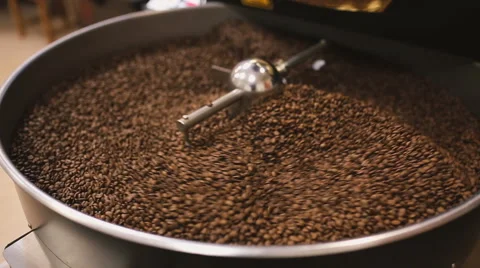 Roasting coffee in the coffee machine. Close-up Stock Footage 58957508