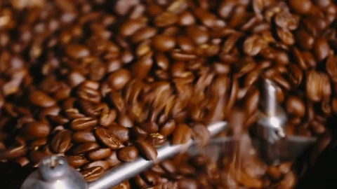 Roasting coffee. Coffee roasting machine. Close-up. 스톡 동영상 100755716