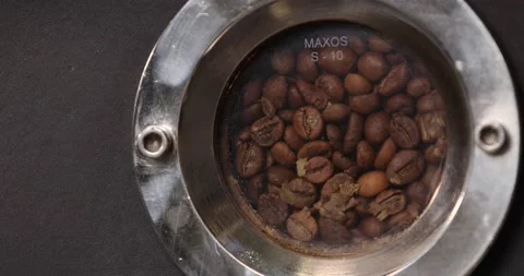 Roasting coffee process in the production. Modern equipment. Vídeo Stock 239057174