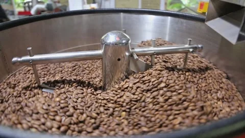 Roasting Coffee while rotating the coffee beans Stock Footage 293167690