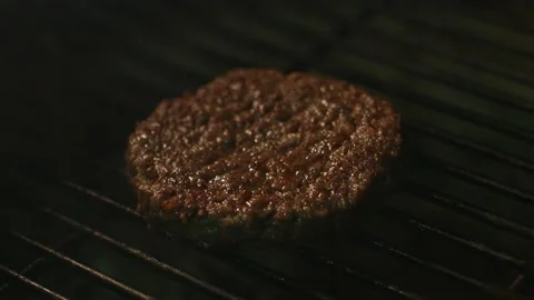 Roasting a cutlet on the grill Stock Footage 153154405