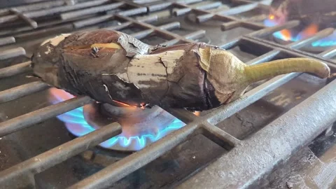 Roasting Eggplants Stock Footage 325343594