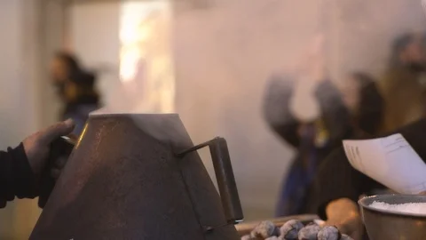 Roasting fresh chestnuts in Lisbon Stock Footage 108042295