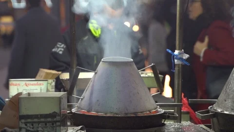Roasting fresh chestnuts in Lisbon Stock Footage 108043788