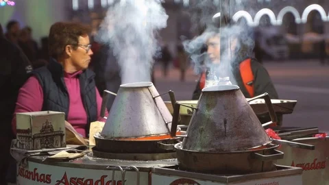 Roasting fresh chestnuts in Lisbon Stock Footage 108043918