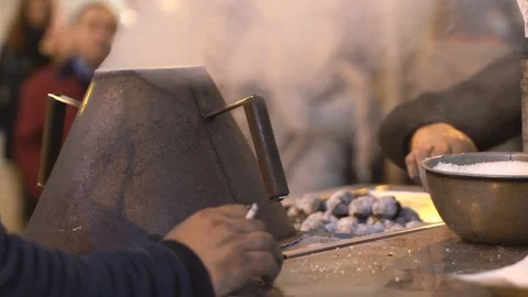 Roasting fresh chestnuts in Lisbon Stock Footage 108046209