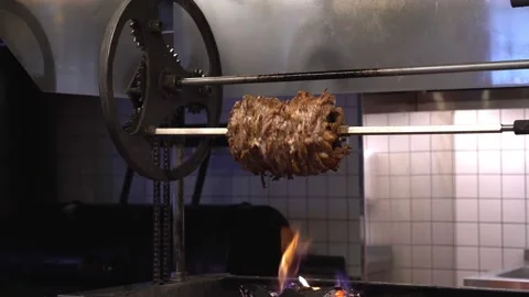 Roasting juicy meat steak with spices and herbs in burning charcoals fire on bbq Stock Footage 171682053