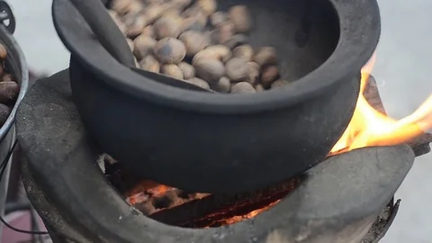 Roasting local chestnut Thai snack on street food. 스톡 동영상 81688165