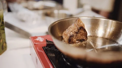Roasting marinated beef in a frying pan Stock Footage 120491407