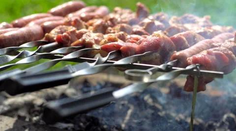 Roasting meat on brazier.Pack of 4 shots. Stock Footage 66586306