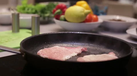 Roasting meat on a frying pan Stock Footage 58086277