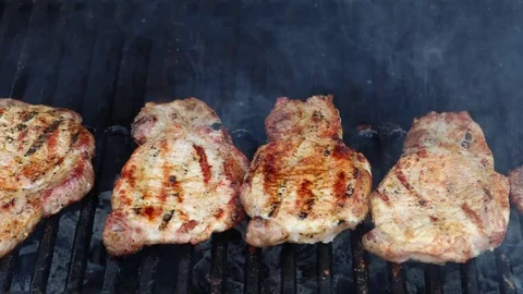 Roasting meat on the grill Stock Footage 74894859