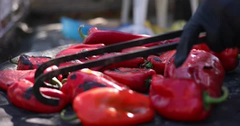 Roasting process of red pepper for ajvar. Balkan recipe for ajvar Stock Footage 207723178