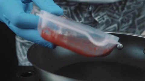 Roasting raspberry jam in a frying pan Stock Footage 88713497