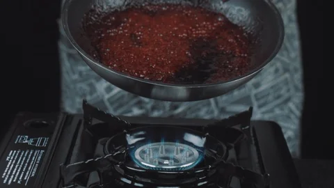 Roasting raspberry jam in a frying pan Stock Footage 88713852