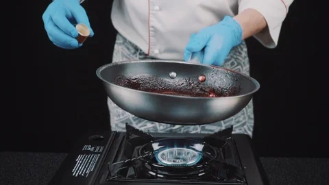 Roasting raspberry jam in a frying pan Stock Footage 88714181