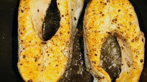 Roasting a red fish steak. Stock Footage 263753181