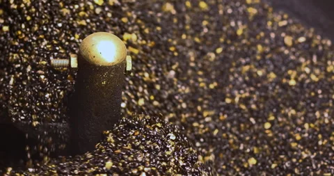 Roasting Sand for Chestnuts in a hot pan, close-up. rolling and heating Stock Footage 332479019