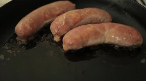 Roasting sausages Stock Footage 58622913