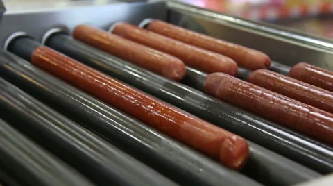 Roasting the Sausages Stock Footage 66254084