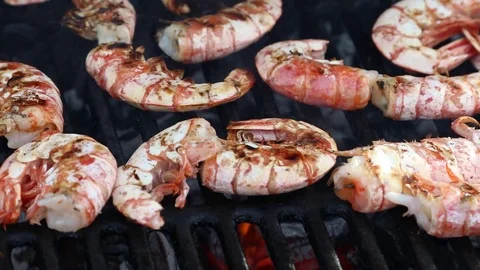 Roasting shrimps on the grill Stock Footage 74895330