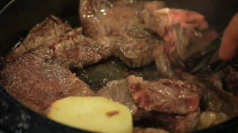 Roasting sliced beef on hot pan Stock Footage 46033046