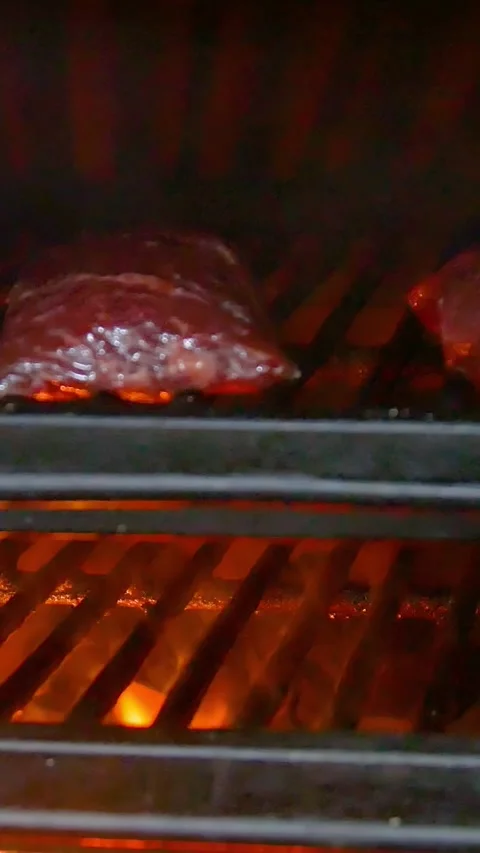 Roasting steak in a restaurant. Vertical video. Stock Footage 290217155