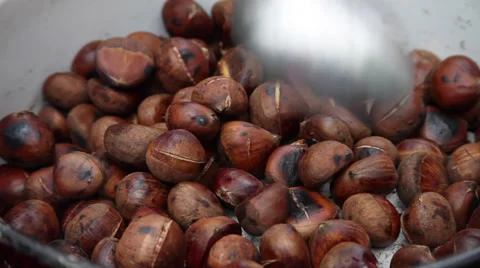 Roasting sweet chestnuts, cooked nuts, street vendor, hot food 스톡 동영상 37124377