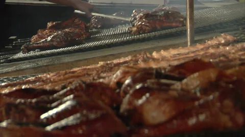 Roasting Turkey Legs at a State Fair Stock-Footage 30796193