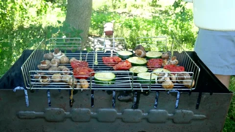 Roasting vegetables on the grill. Assorted vegetables Stock Footage 203814004