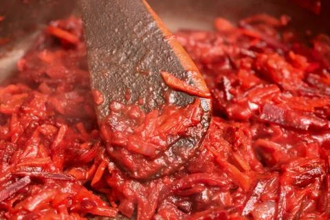 Roasting vegetables with tomato paste. Roast beetroot, onion and tomato paste Stock Photos