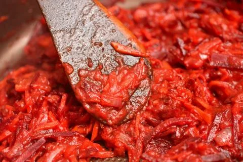 Roasting vegetables with tomato paste. Roast beetroot, onion and tomato paste Stock Photos