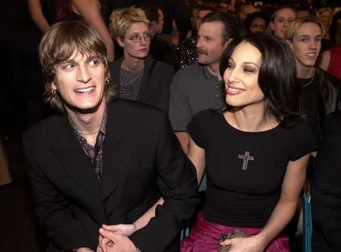 Rob Thomas (Matchbox Twenty) with his wife at the 2000 Billboard Music Awards in Stock Photos
