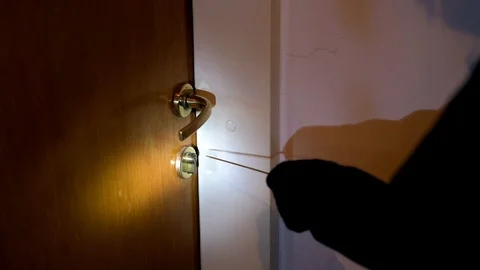Robber breaking the door lock Video stock 105444859